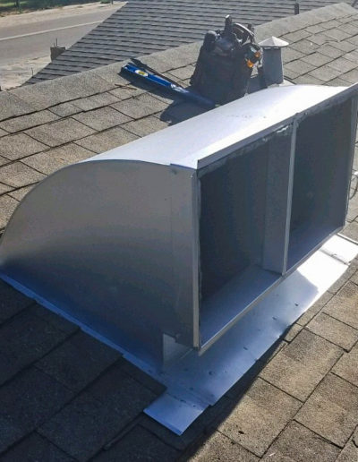 Silver colored rooftop HVAC intake